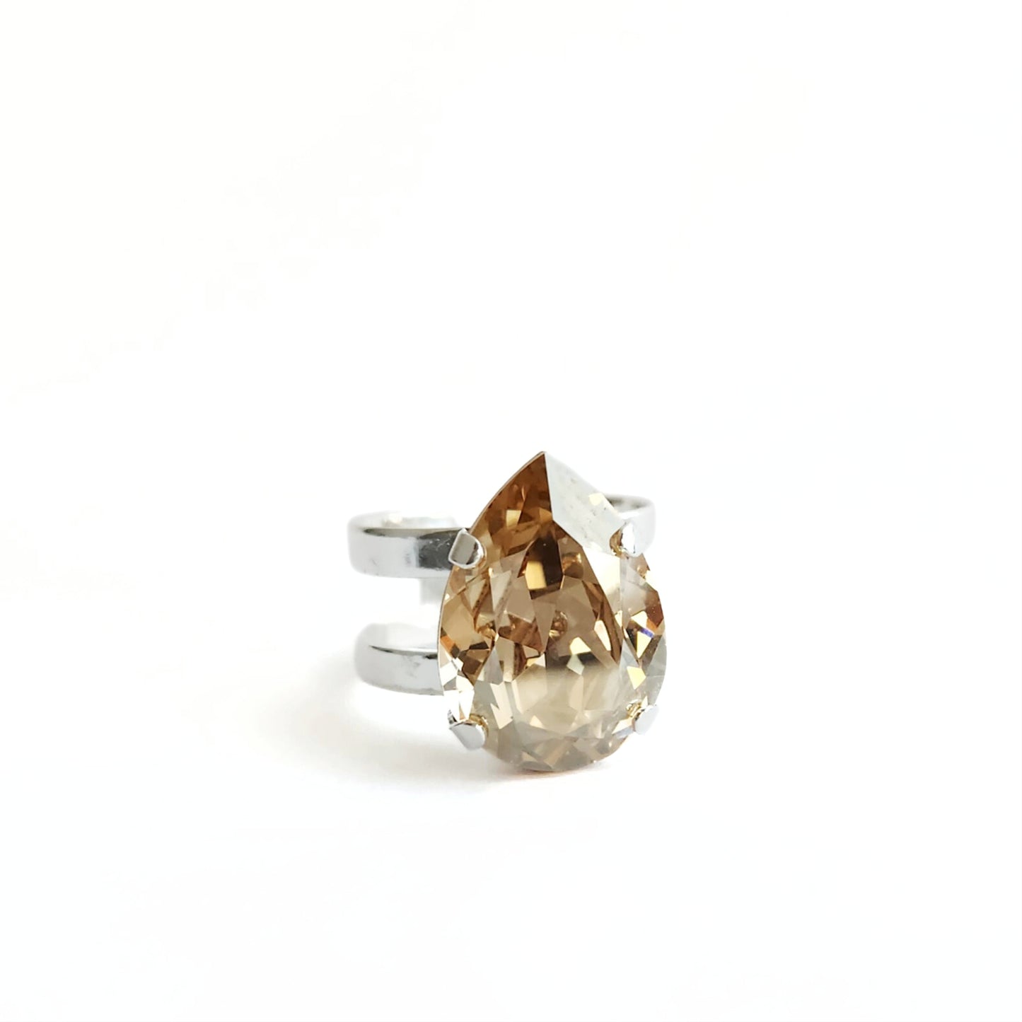 Cosmic Ring in Golden Shadow